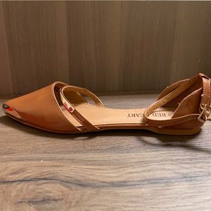Red heart tan and gold hardware flats